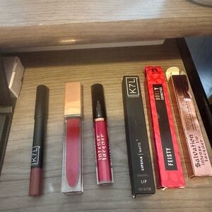 Feisty Lipsticks, eyeshadow/contour lot- different shades of reds matte & glossy